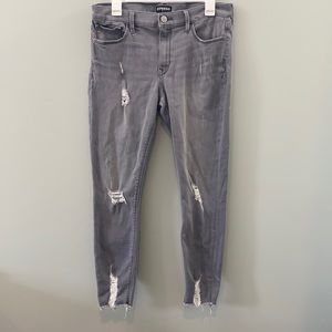 Express grey distressed ankle jeans.